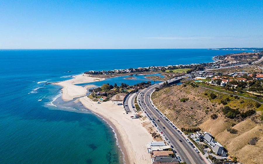 Panoramic view of a luxurious gated community in Malibu with stunning ocean views